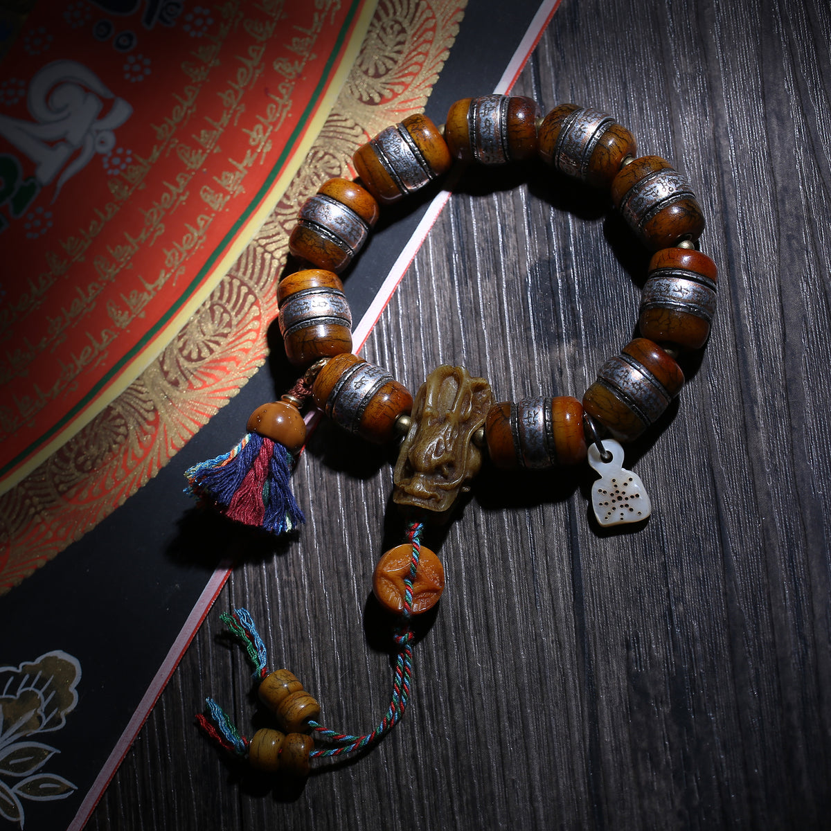 Brown Barrel-Bead Bracelet with Metal-Tone Bands and Charms