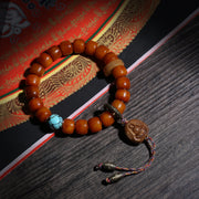 Detail view of Minimalist Amber-Color Buddhist Bead Bracelet (4 of 6)