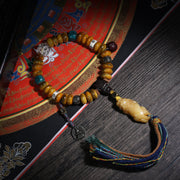 Detail view of Golden Brown Handheld Tibetan Prayer Beads with Tassel (2 of 6)