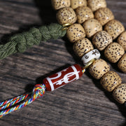 Detail view of Speckled 108 Mala Beads with Dzi-Style Accent (3 of 7)