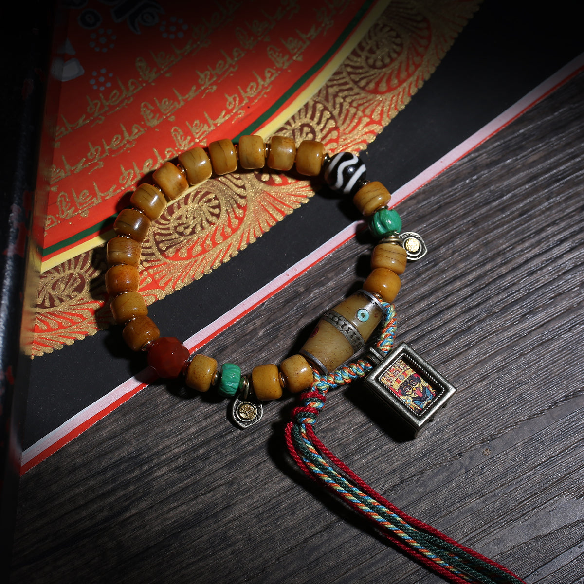 Detail view of Golden Brown Tibetan Bracelet with Amulet Charm (2 of 6)