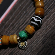 Detail view of Golden Brown Tibetan Bracelet with Amulet Charm (3 of 6)