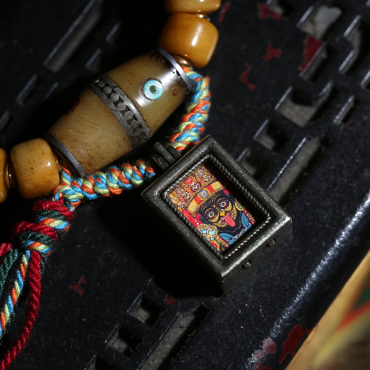 Detail view of Golden Brown Tibetan Bracelet with Amulet Charm (5 of 6)