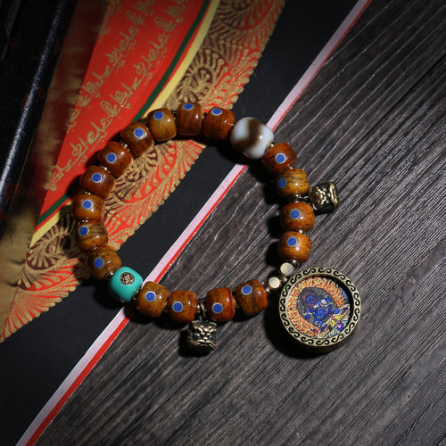 Detail view of Brown Inlaid Bead Tibetan Bracelet with Medallion Charm (2 of 6)