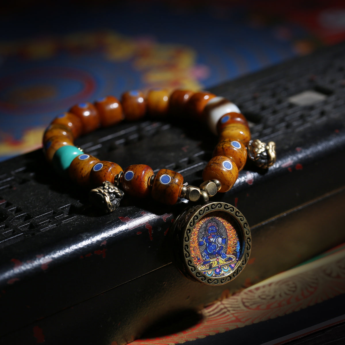 Detail view of Brown Inlaid Bead Tibetan Bracelet with Medallion Charm (5 of 6)