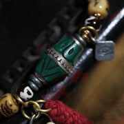 Detail view of Carved Cream Bead Tibetan Bracelet with Green Accent (2 of 6)