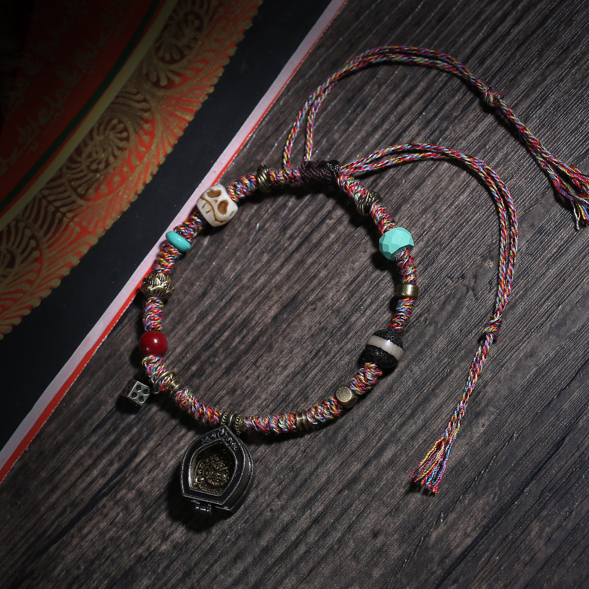 Multicolor Cord Buddhist Bracelet with Amulet Charm