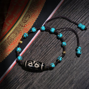Turquoise-Color Tibetan Bracelet with Dzi-Style Centerpiece
