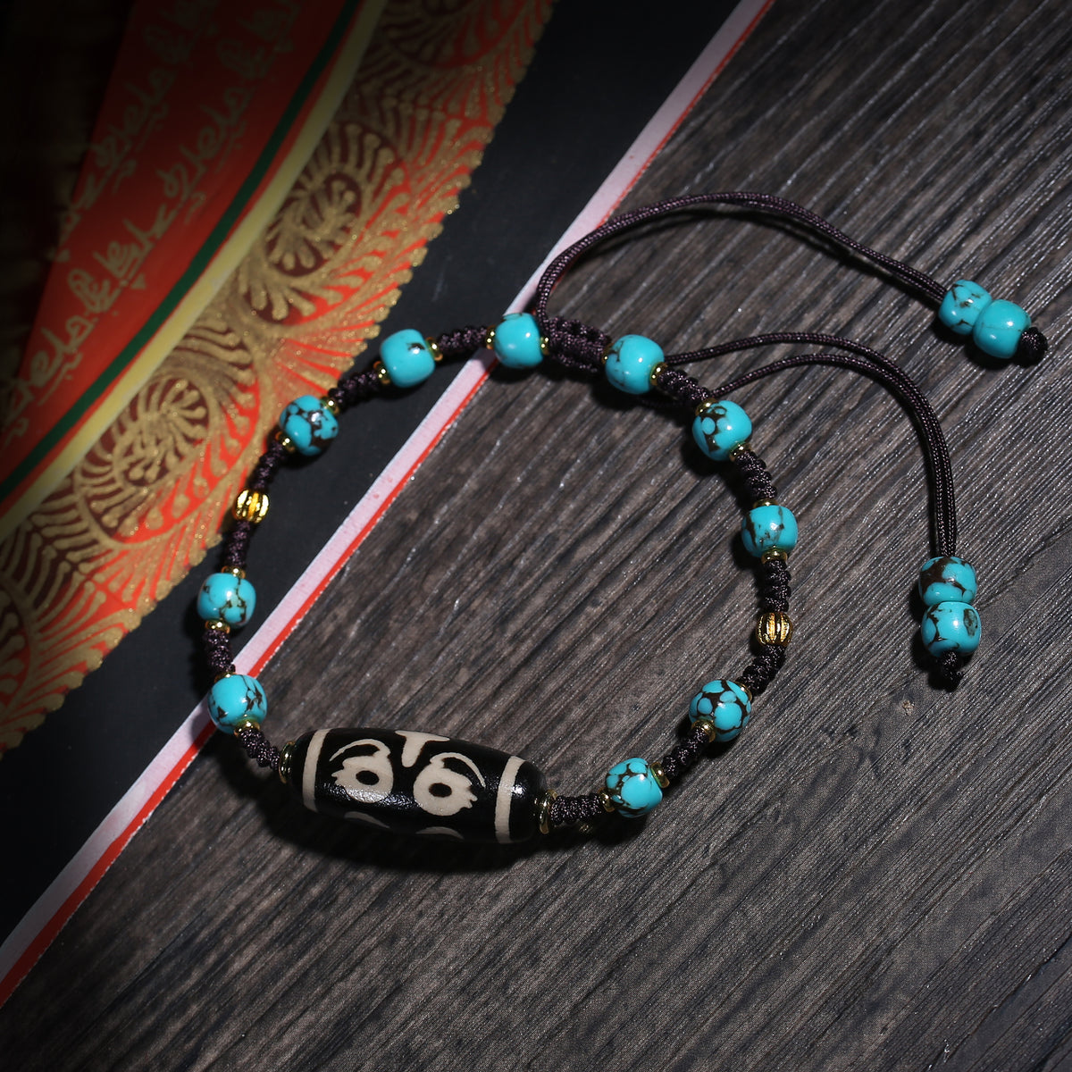 Turquoise-Color Tibetan Bracelet with Dzi-Style Centerpiece