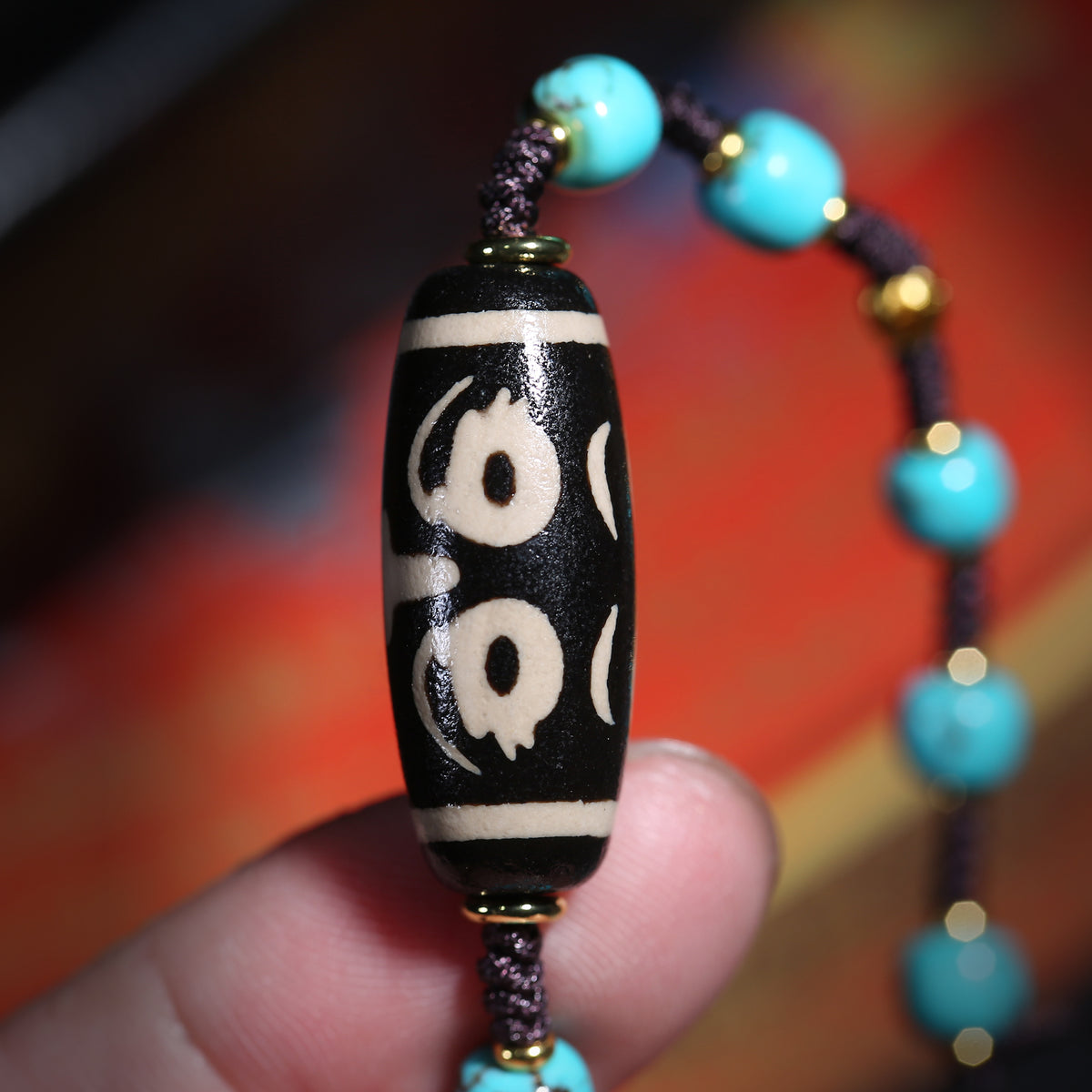 Detail view of Turquoise-Color Tibetan Bracelet with Dzi-Style Centerpiece (4 of 6)