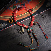 Detail view of Red Carved Handheld Buddhist Prayer Beads with Tassels (2 of 6)
