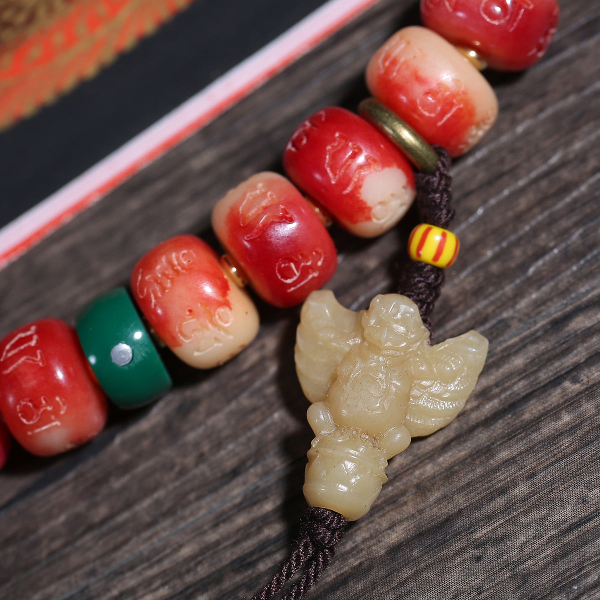 Detail view of Red Carved Handheld Buddhist Prayer Beads with Tassels (3 of 6)