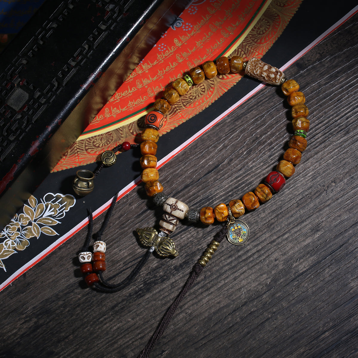 Golden Brown Handheld Buddhist Prayer Beads with Charms