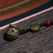 Detail view of Golden Brown Handheld Buddhist Prayer Beads with Charms (4 of 6)