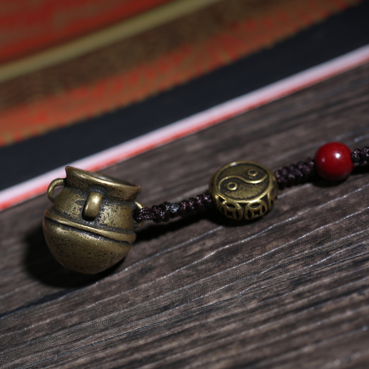 Detail view of Golden Brown Handheld Buddhist Prayer Beads with Charms (4 of 6)