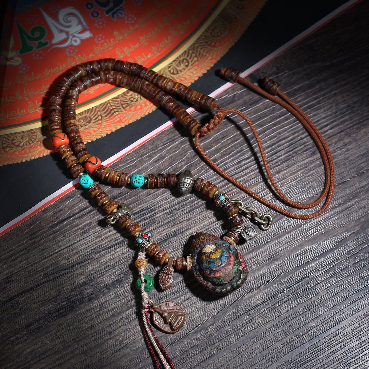 Detail view of Dark Brown 108 Mala Beads with Turquoise-Color Accents (2 of 6)
