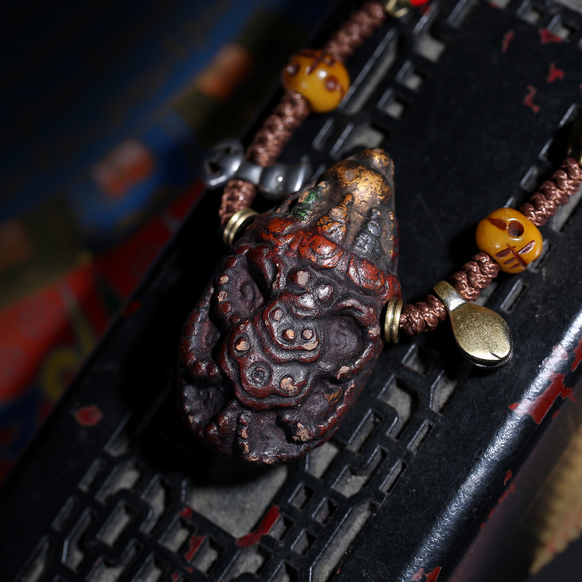 Detail view of Carved Tibetan Necklace with Turquoise-Color Amulet (2 of 7)