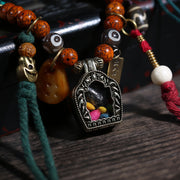 Tibetan Bead Necklace with Framed Amulet Pendant