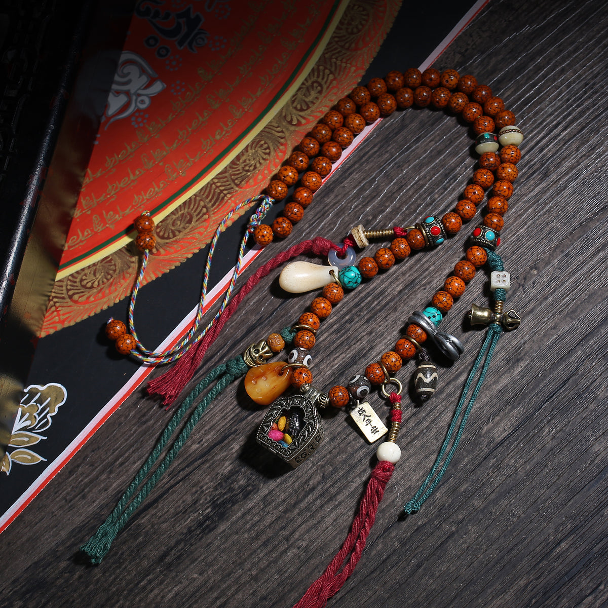 Detail view of Tibetan Bead Necklace with Framed Amulet Pendant (2 of 6)