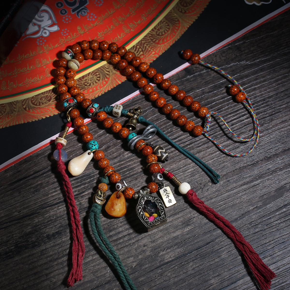 Detail view of Tibetan Bead Necklace with Framed Amulet Pendant (3 of 6)